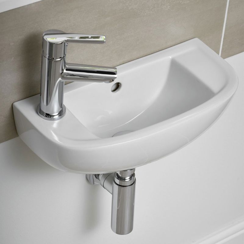 A small wash basin with a tap