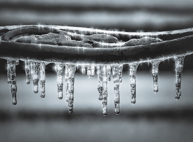 Frozen pipes with icicles.